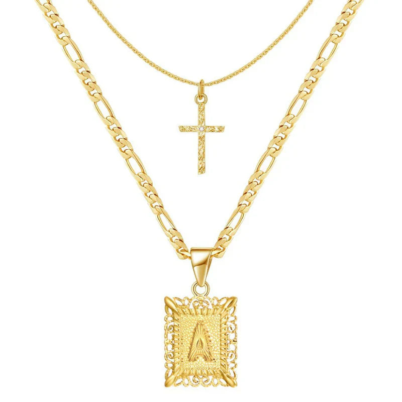 Set de collar inicial con cruz | Oro