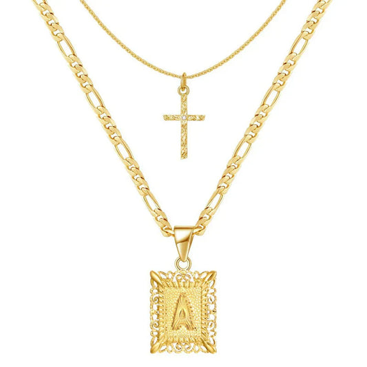 Set de collar inicial con cruz | Oro