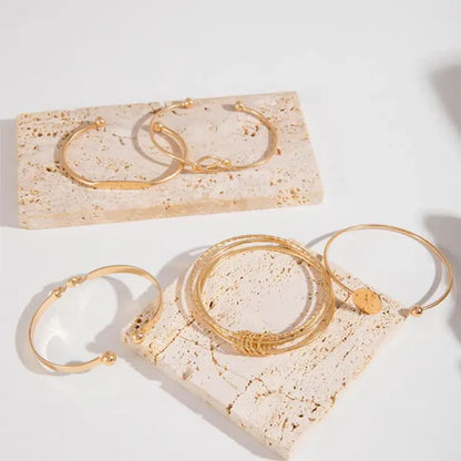 Set de pulseras Knotted Elegance | Oro