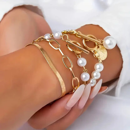 Set de pulseras de 4 piezas Chic Gold – Serpiente, perlas y eslabones | Oro
